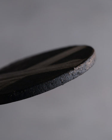 Dessous de verre noir